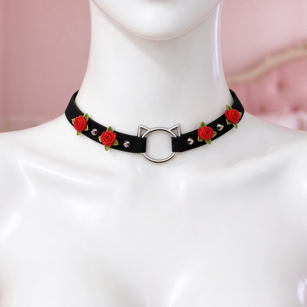 Rose Claw Choker in black with red roses, front view on a mannequin