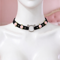 Rose Claw Choker in black with pink roses, front view on a mannequin