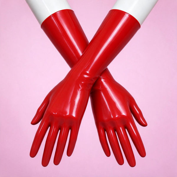 Red Alert red patent opera gloves crossed on white mannequin forearms, close-up