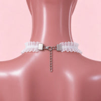 Jingle Brat Lace Collar in white, back view showing the lobster clasp and silver extension chain