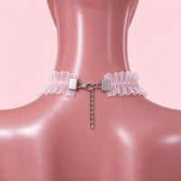 Jingle Brat Lace Collar in pink, back view showing the lobster clasp and silver extension chain