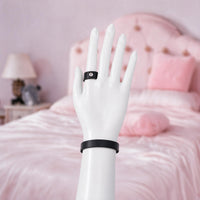 Heartgrip hand harness, palm side view showing the straps and wrist strap