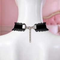 Heartache Lace Choker in black, back view showing the lobster clasp and silver extension chain