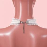 Flutterbite Lace Choker in white, back view showing the lobster clasp and silver extension chain