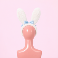 Hop Off bunny ear headband with blue bow, back view showing the plush-wrapped band