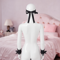 After Hours lace mask and cuffs set, back view showing the satin ribbon ties