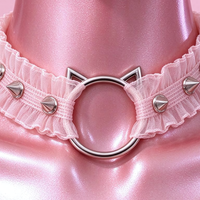 Feral Kitten Lace Choker in pink, close-up of the centre detail