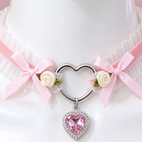 Heartache Lace Choker in pink, close-up of the centre detail