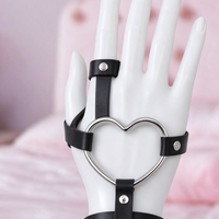 Heartgrip hand harness, close-up of the silver heart ring and finger snap loop