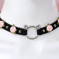 Rose Claw Choker in black with pink roses, close-up of the centre detail