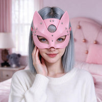 Pink faux-leather fox mask worn close-up on a model, both ears fully visible