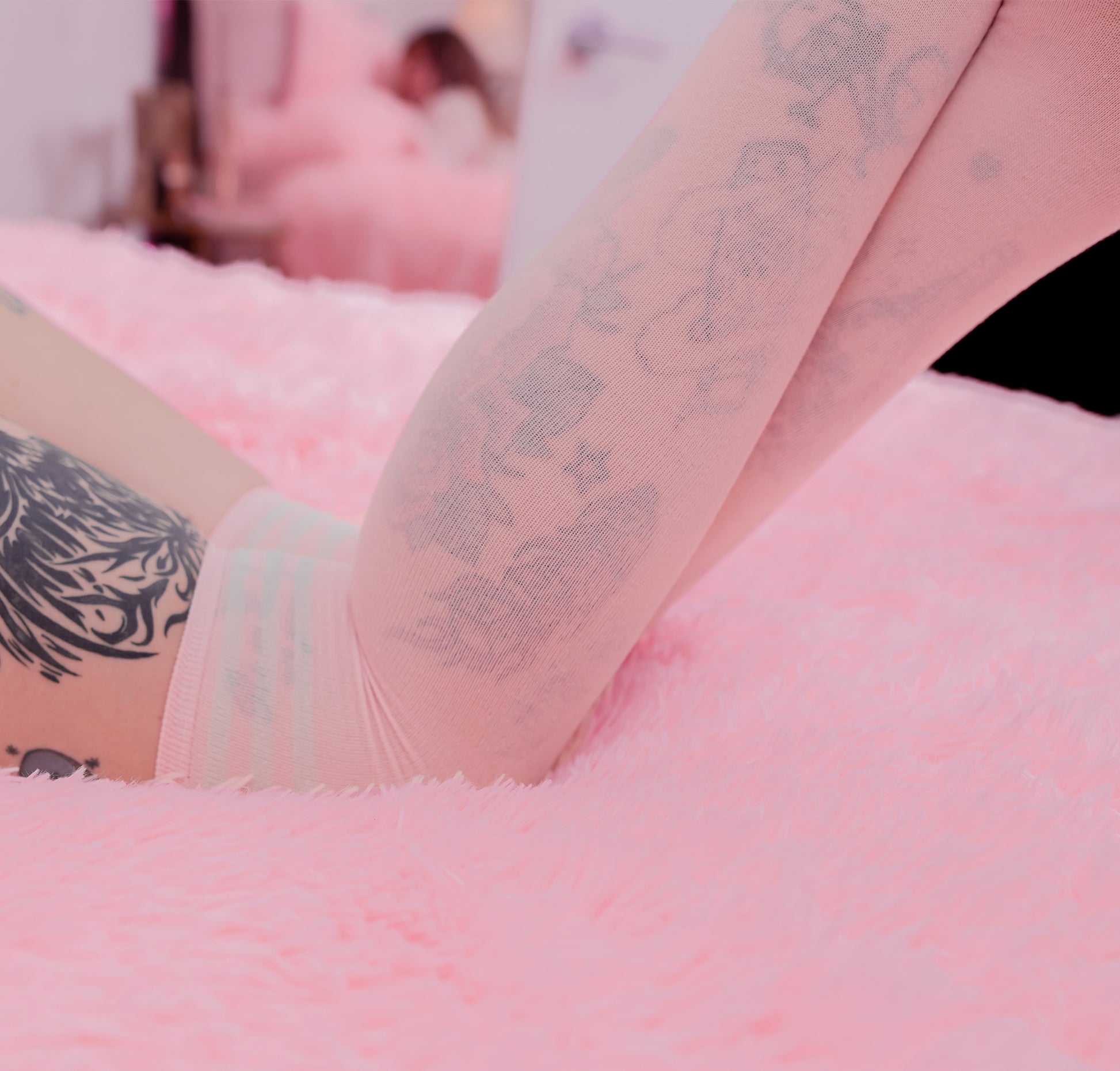 Pink thigh-high shimapan socks with white stripes, soft knit fabric, modeled in kawaii bedroom setup for anime cosplay and OnlyFans outfits.