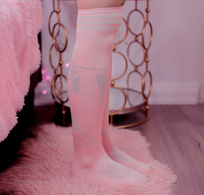 Pink thigh-high shimapan socks with white stripes, soft knit fabric, modeled in kawaii bedroom setup for anime cosplay and OnlyFans outfits.