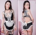 Woman wearing a black and white maid outfit with lace details, shown from front and back.