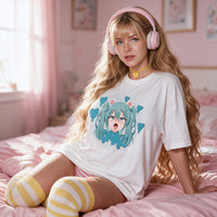 VSCO Catgirl white oversized shirt — seated front on in soft window light