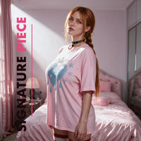 Signature Piece: portrait in the pink oversized shirt, glittery crowned ice heart on the chest