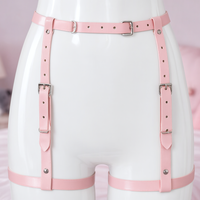 Strawberry Buckle leg harness, close-up of the straps and silver-tone hardware
