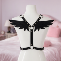 Fallen Angel feather wing back harness, front view on a mannequin