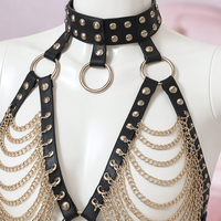 Gold Digger studded collar gold chain harness, close-up of the straps and gold-tone hardware