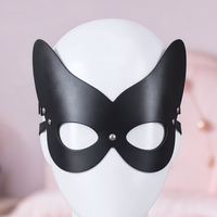 Masquerade mask, close-up of the straps and silver-tone hardware