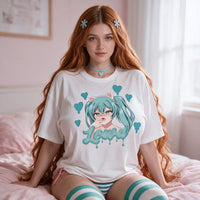 Magical Neko White Oversized Shirt — seated front on in soft window light