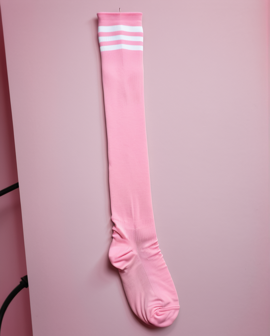 Pink thigh-high shimapan socks with white stripes, soft knit fabric, modeled in kawaii bedroom setup for anime cosplay and OnlyFans outfits.