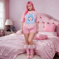 Tulle Trouble leg warmers worn with a pleated skirt in a pink bedroom