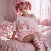 Sitting on the bed in the pink oversized shirt, relaxed, the dripping Lewd script on show
