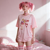 Yandere Confession pink oversized shirt — standing in a hard shaft of afternoon light