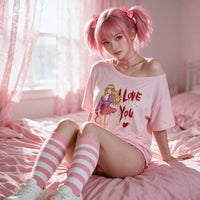 Yandere Confession pink oversized shirt — seated off the shoulder on the pink bed