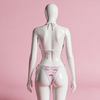 Back view of the Ahegao Pink Waifu Bikini on a white hourglass mannequin in a pink studio