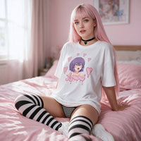 Lewd Otaku white oversized shirt — seated on a pink bed with striped thigh highs
