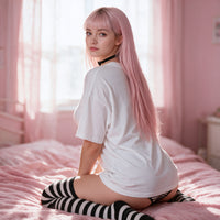 Lewd Otaku white oversized shirt — kneeling back view on the pink bed