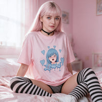 Sakura sitting back on a pink bed in the pink oversized shirt with striped thigh high socks