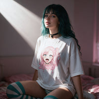 Standing in window light wearing the white Ahegao Delulu shirt