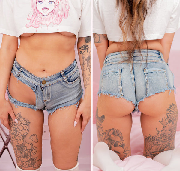 Model Posing in Denim Booty Shorts for Photoshoot